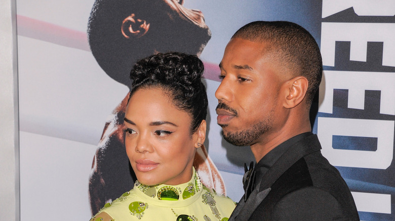 Tessa Thompson and Michael B. Jordan pose on the red carpet