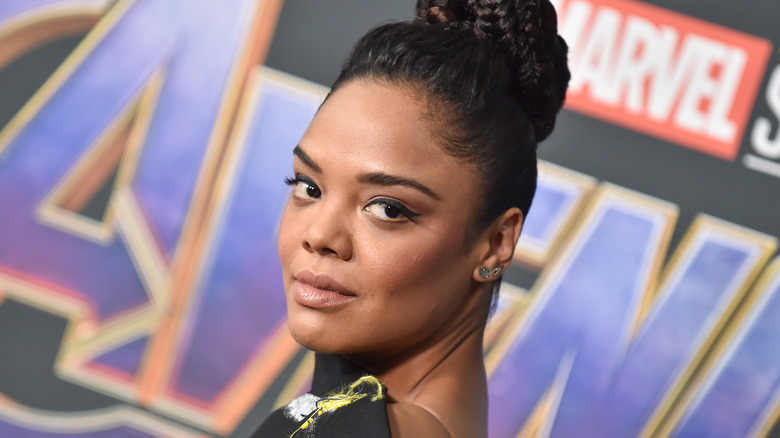 Tessa Thompson poses on the red carpet