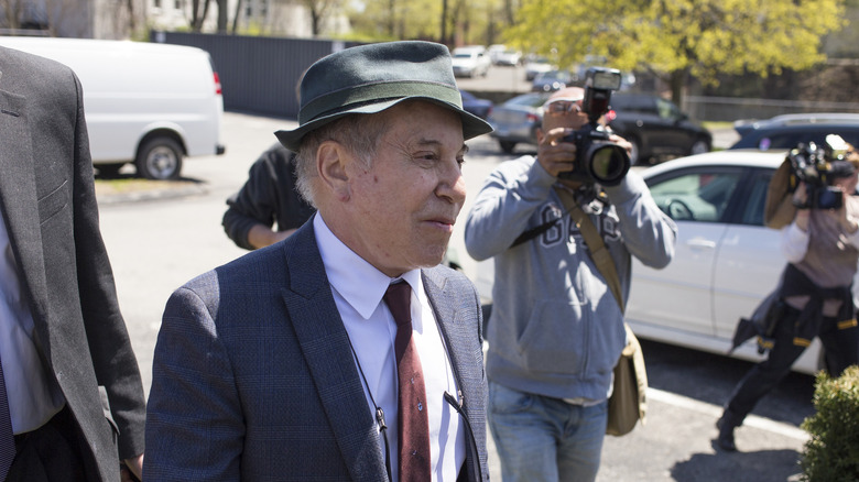 Paul Simon leaves court