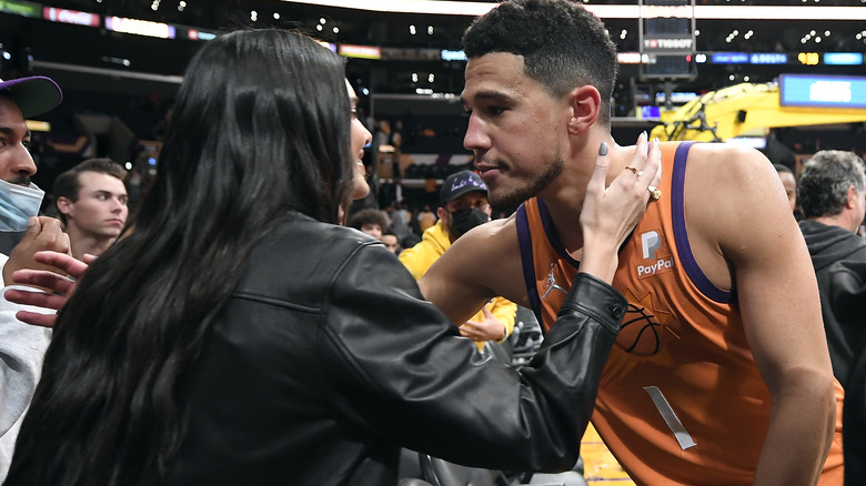 Kendall Jenner and Devin Booker #1 of the Phoenix Suns