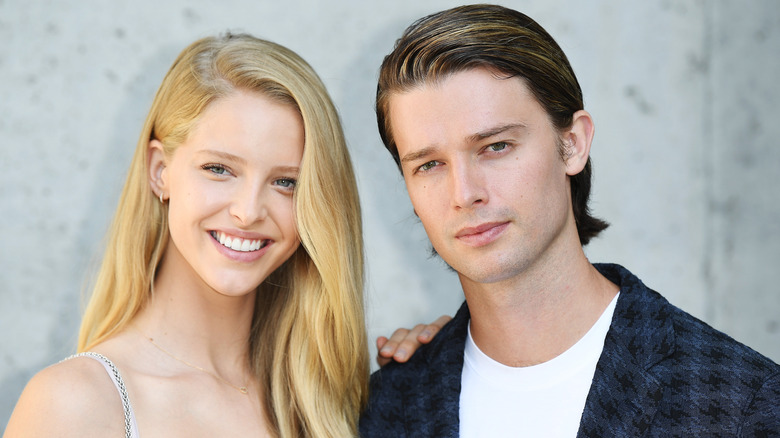 Abby Champion and Patrick Schwarzenegger posing