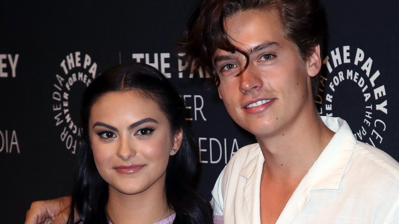 Camila Mendes and Cole Sprouse smiling