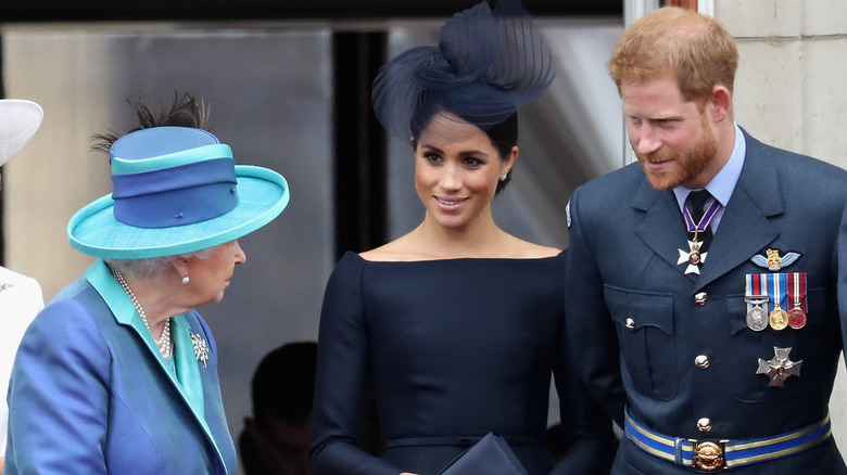 Queen Elizabeth with Meghan Markle and Prince Harry