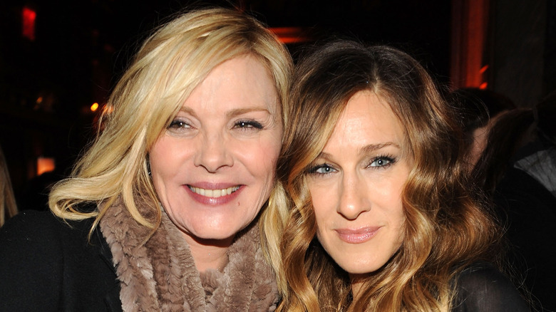 Kim Cattrall and Sarah Jessica Parker pose for a photo 