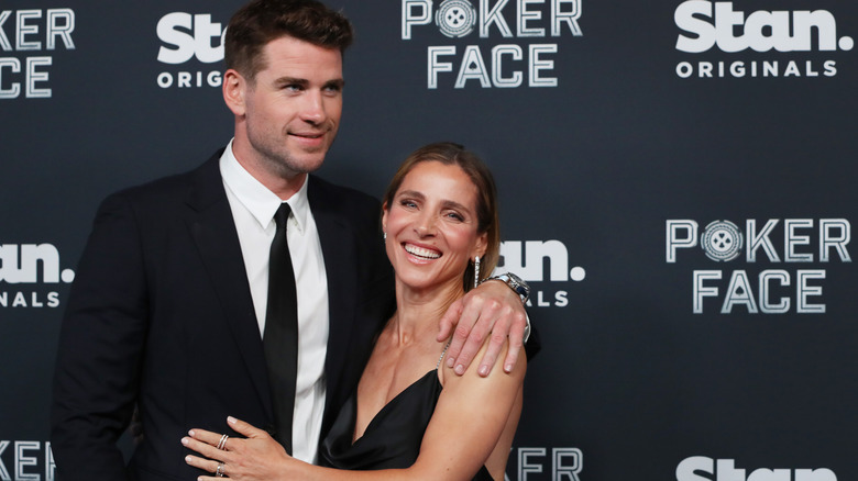 Elsa Pataky and Liam Hemsworth embracing