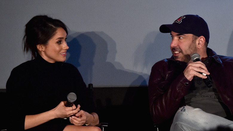 Meghan Markle and Rick Hoffman eye contact