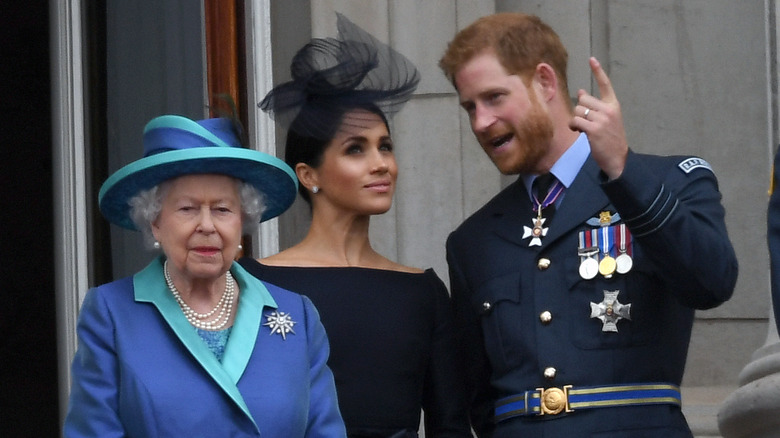 Queen Elizabeth with Meghan Markle and Prince Harry