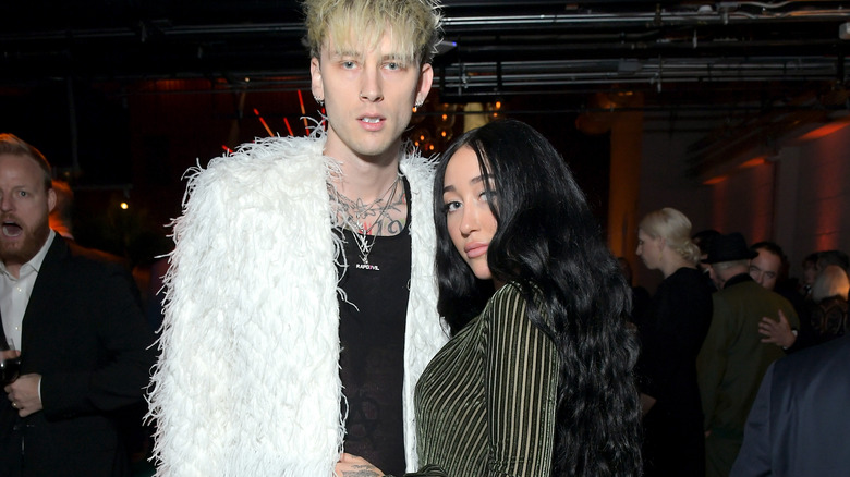 Noah and MGK at a party 