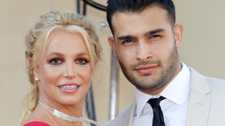 Britney Spears and Sam Asghari smiling