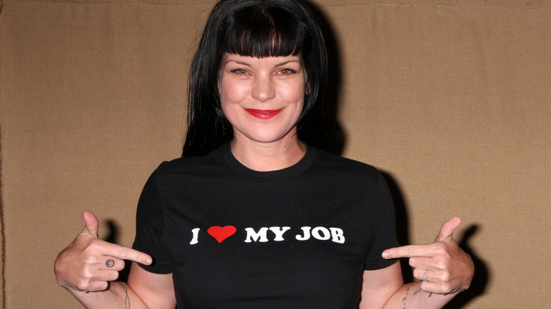 Pauley Perrette pointing at t-shirt