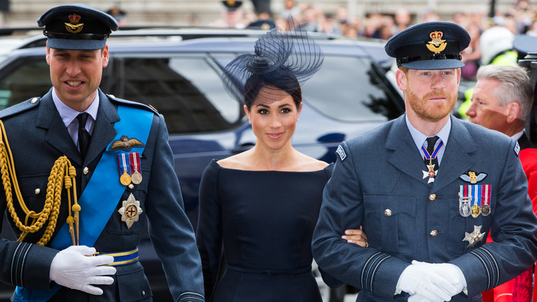 Prince William, Meghan Markle, and Prince Harry walking