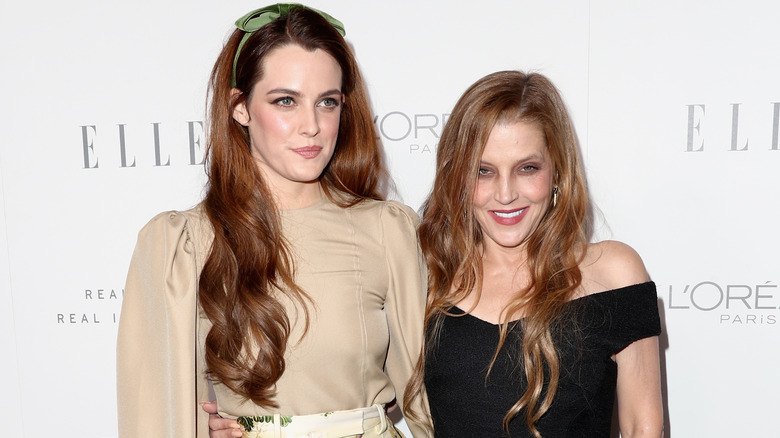 Riley Keough and Lisa Marie Presley smiling