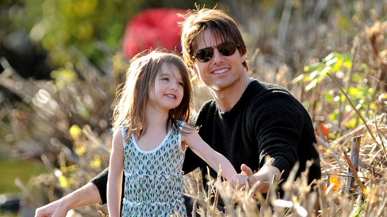 Tom and Suri Cruise at the Charles River Basin