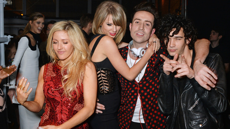 Taylor Swift hangs with fellow popstars, including Matty Healy