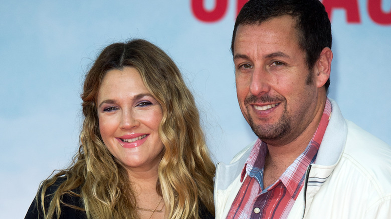 Drew Barrymore and Adam Sandler smiling