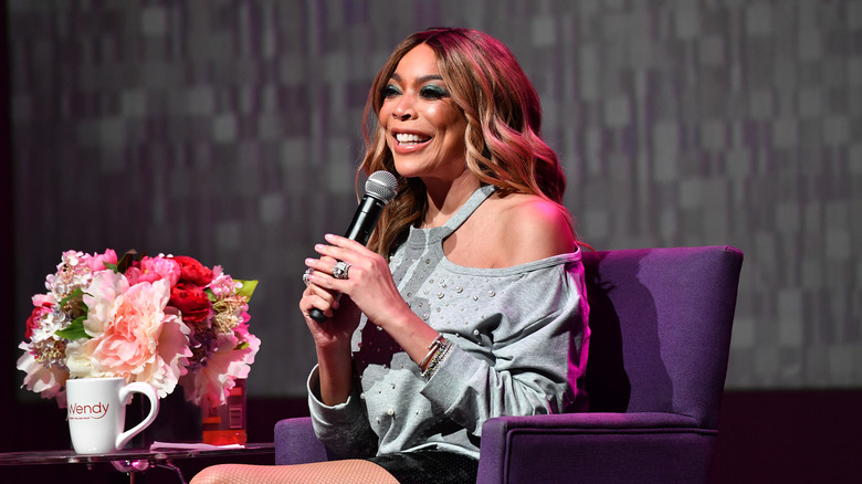 Wendy Williams with mic on stage