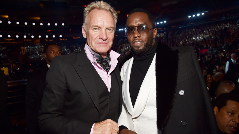 Sting and Diddy posing together 