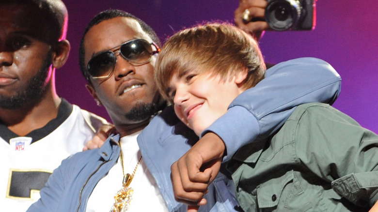 Diddy wrestling Justin Bieber's head