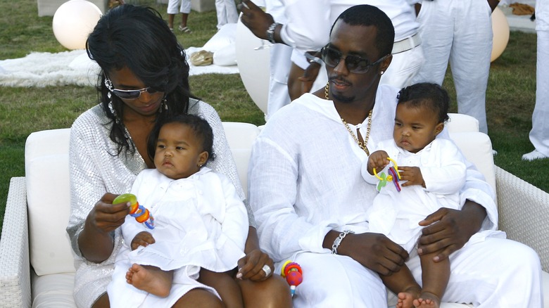 Kim Porter and Diddy with twins