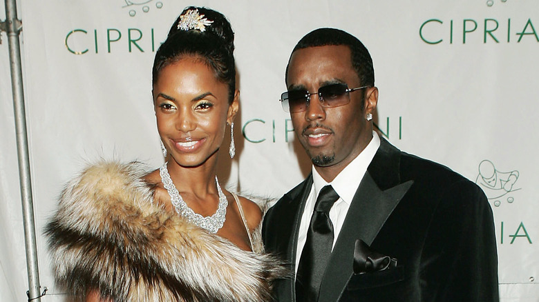 Kim Porter and Diddy posing