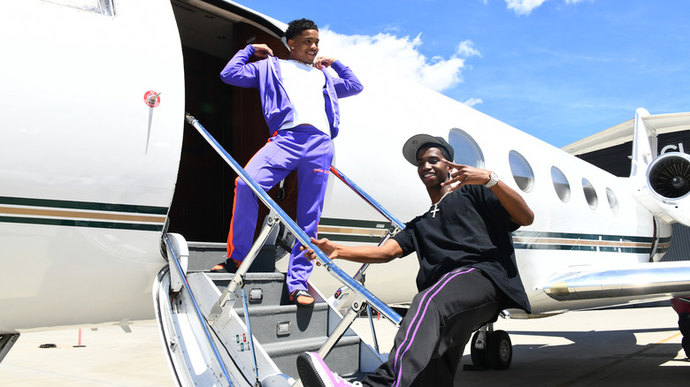 Justin and Christian Combs on a private jet
