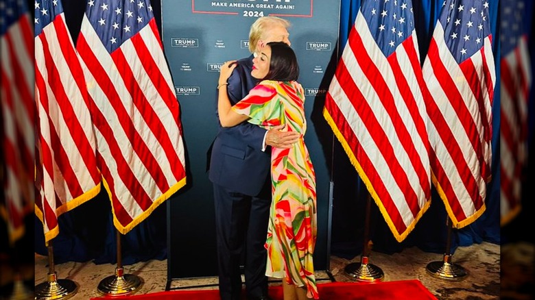 Donald Trump hugging Laura Loomer