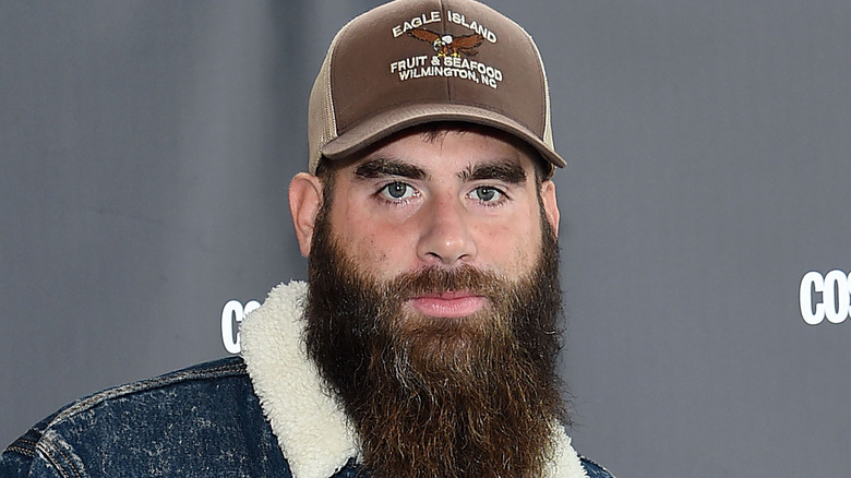 David Eason wearing a brown cap 