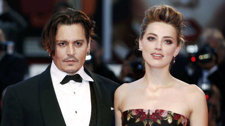 Amber Heard and Johnny Depp pose