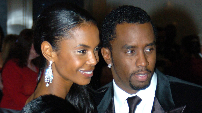 Kim Porter and Diddy posing