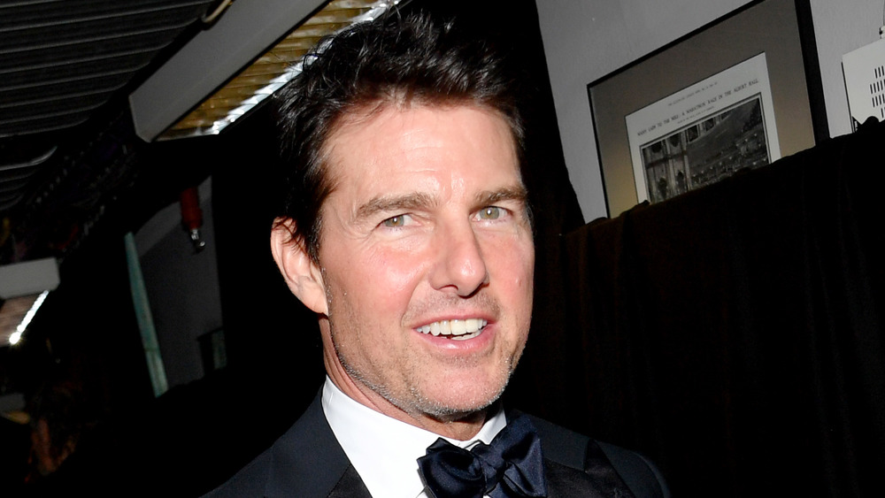 Tom Cruise smiling at camera