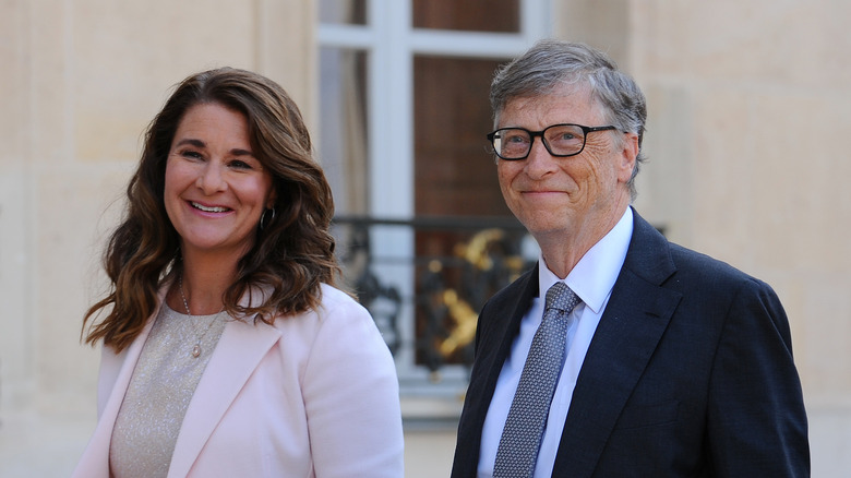 Melinda and Bill Gates smile at an event