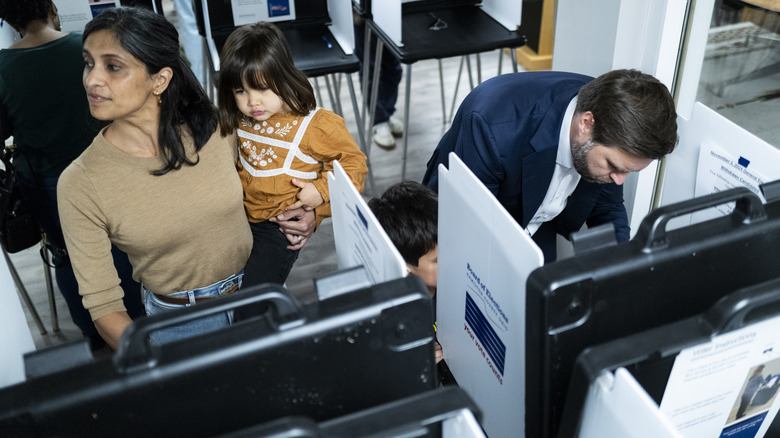 Usha and JD Vance cast their ballots with their kids.