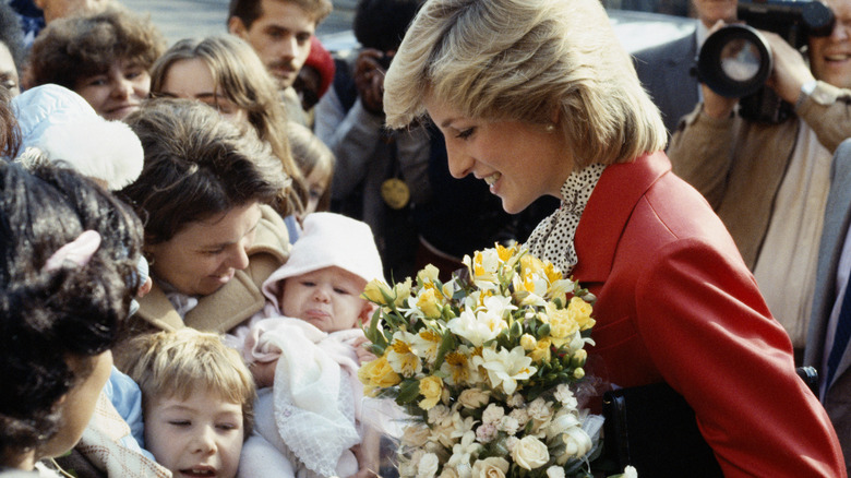 Princess Diana meeting with fans in a crowd