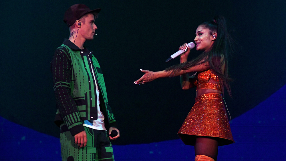 Justin Bieber and Ariana Grande performing together