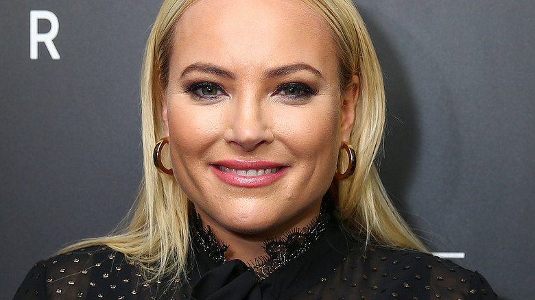 Meghan McCain with wide smile on the red carpet