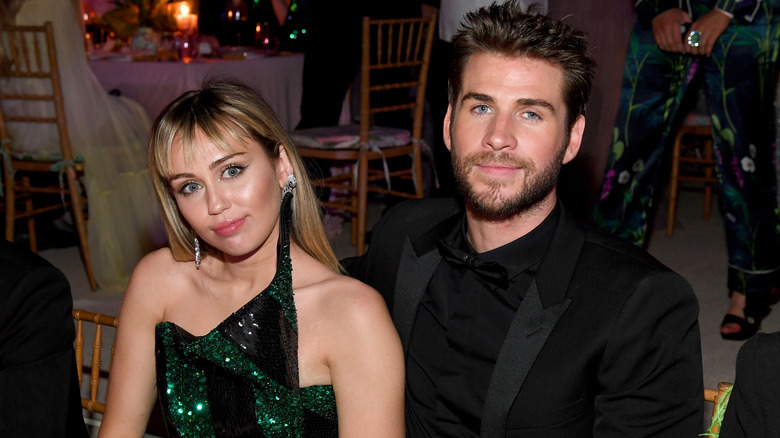 Miley Cyrus and Liam Hemsworth pose together