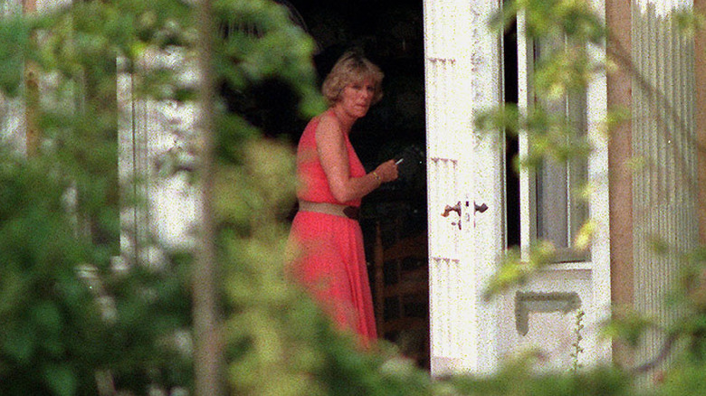 Queen Camilla smoking a cigarette