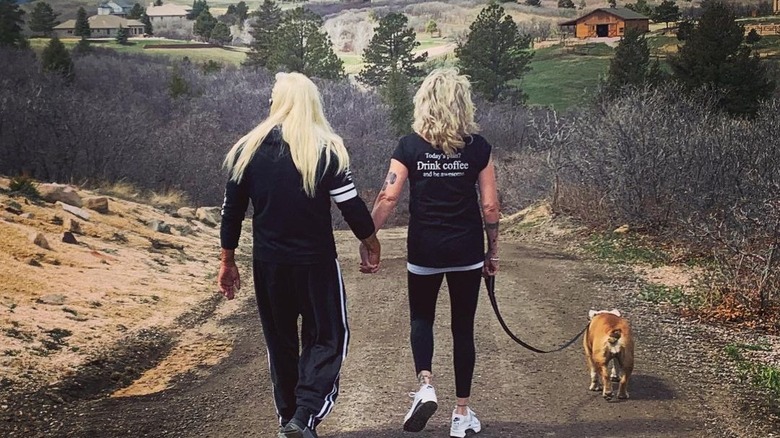 Duane Chapman and Francie Frane walking on a trail