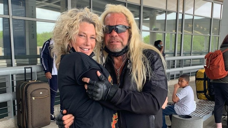 Francie Frane and Duane Chapman posing at airport