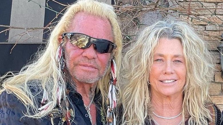 Duane Chapman and Francie Frane posing for cameras