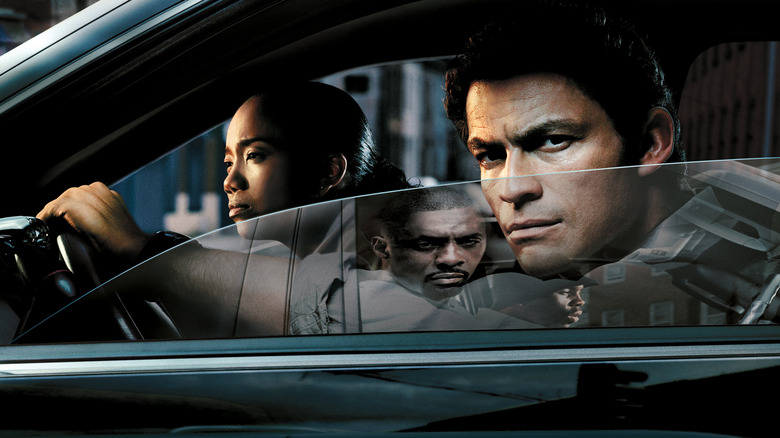 Dominic West in a car