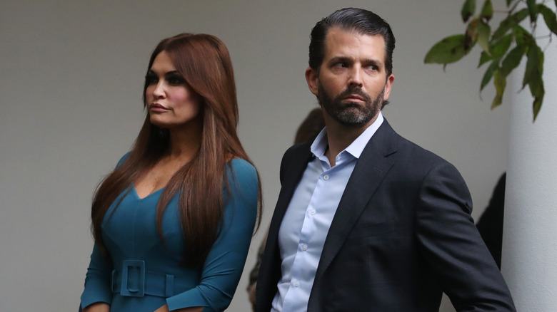 Donald Trump Jr. and Kimberly Guilfoyle looking at odds