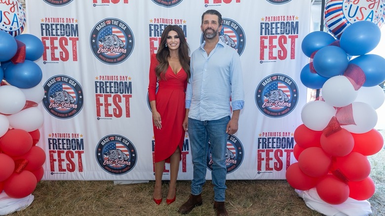 Kimberly Guilfoyle and Donald Trump Jr. posing at Patriots Day Freedom Fest