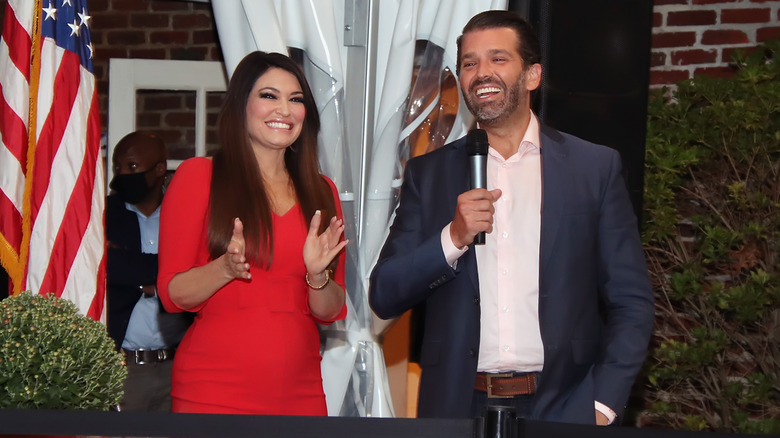 Don Jr. giving a speech next to Kimberly Guilfoyle