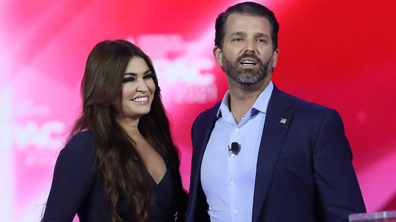 Kimberly Guilfoyle and Donald Trump Jr. smiling