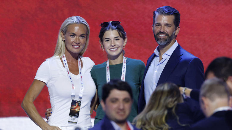 Vanessa Trump, Kai Trump and Donald Trump Jr., standing on stage before the start of the third day of the Republican National Convention at the Fiserv Forum