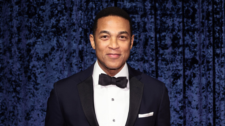 Don Lemon posing at a birthday celebration