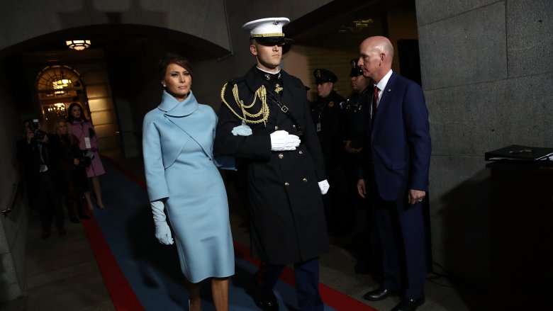 Melania Trump with a military escort