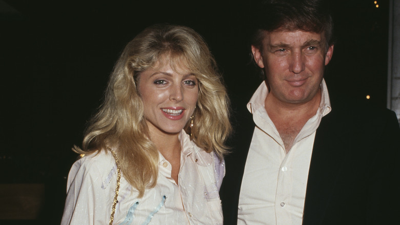 Marla Maples and Donald Trump posing