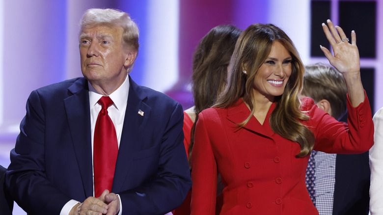 Donald and Melania Trump looking in opposite directions